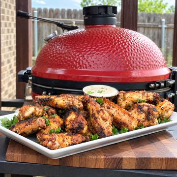 How to Smoke Chicken Wings for a Crowd with Alabama White Sauce on the Kamado Joe Big Joe — food photo