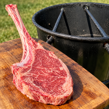 A Unique Way to Cook a Tomahawk Steak on the Grill - Pit Barrel Cooker - Drill Required — food photo